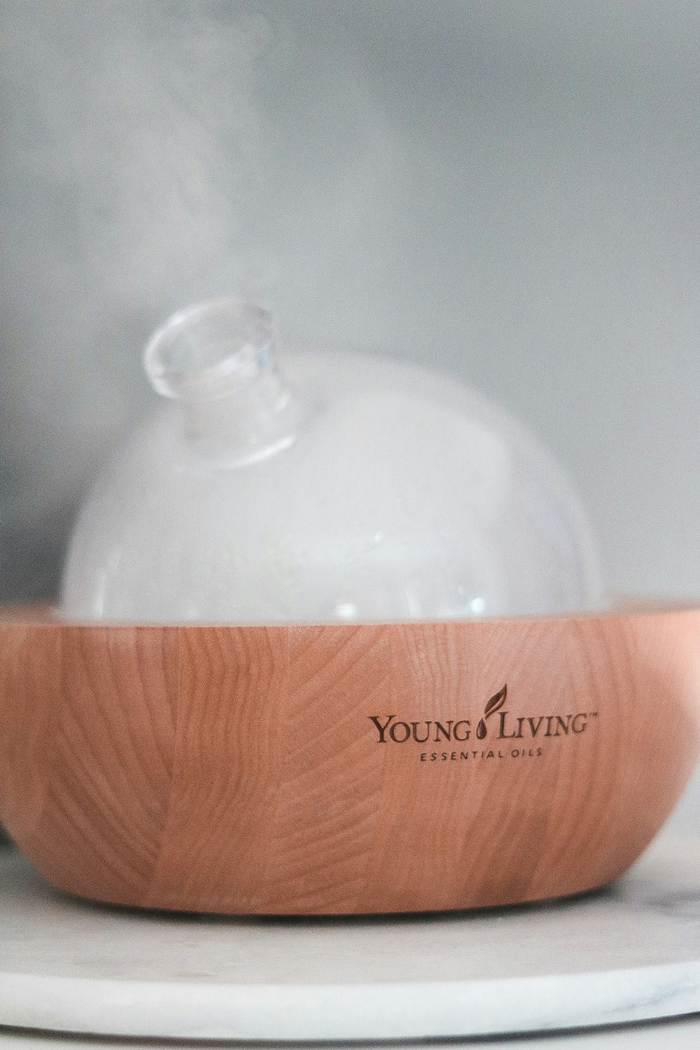 white ceramic bowl on brown wooden table