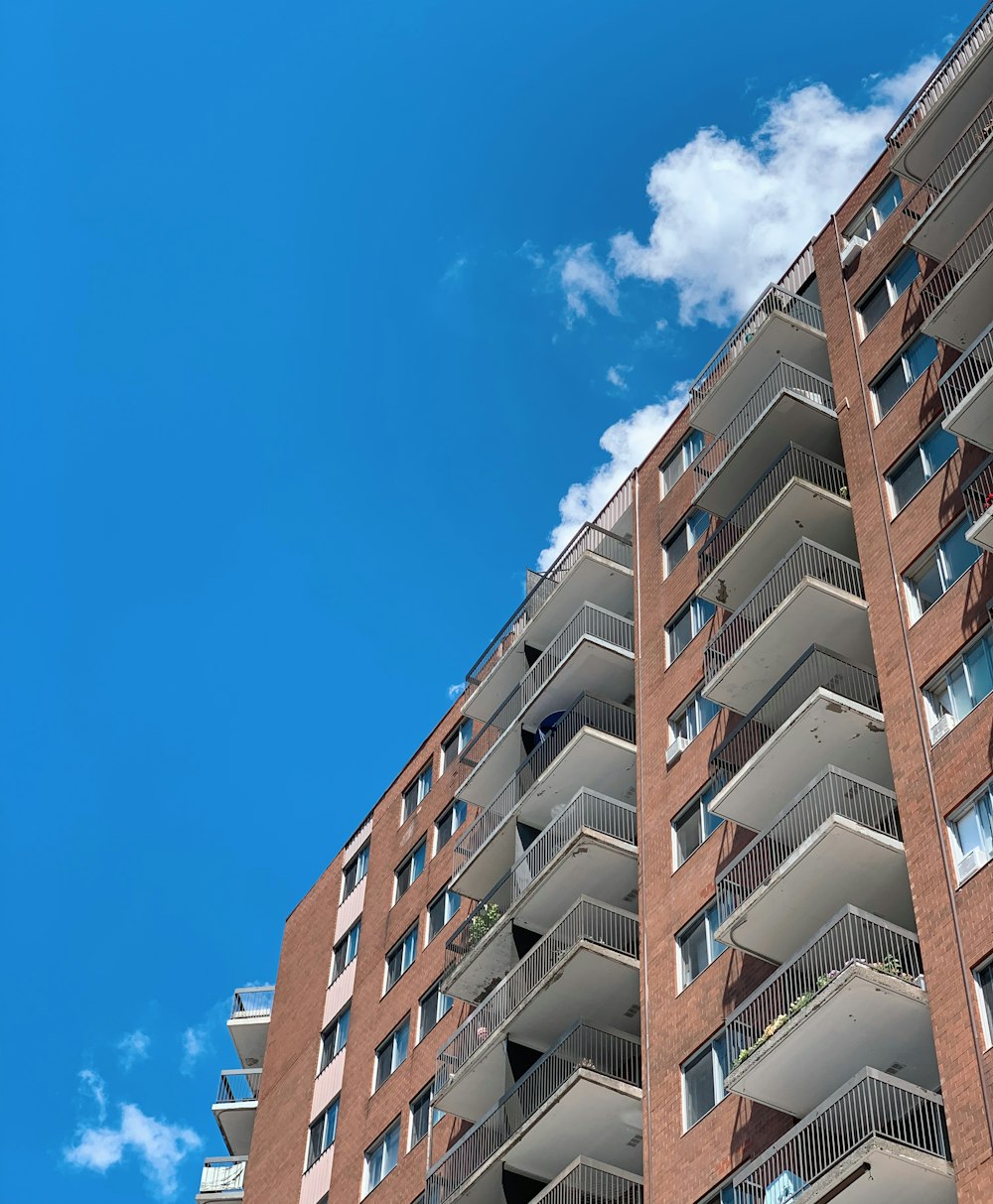 brown concrete building under blue sky during daytime