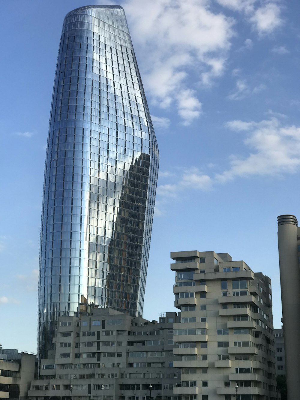 white and blue high rise building