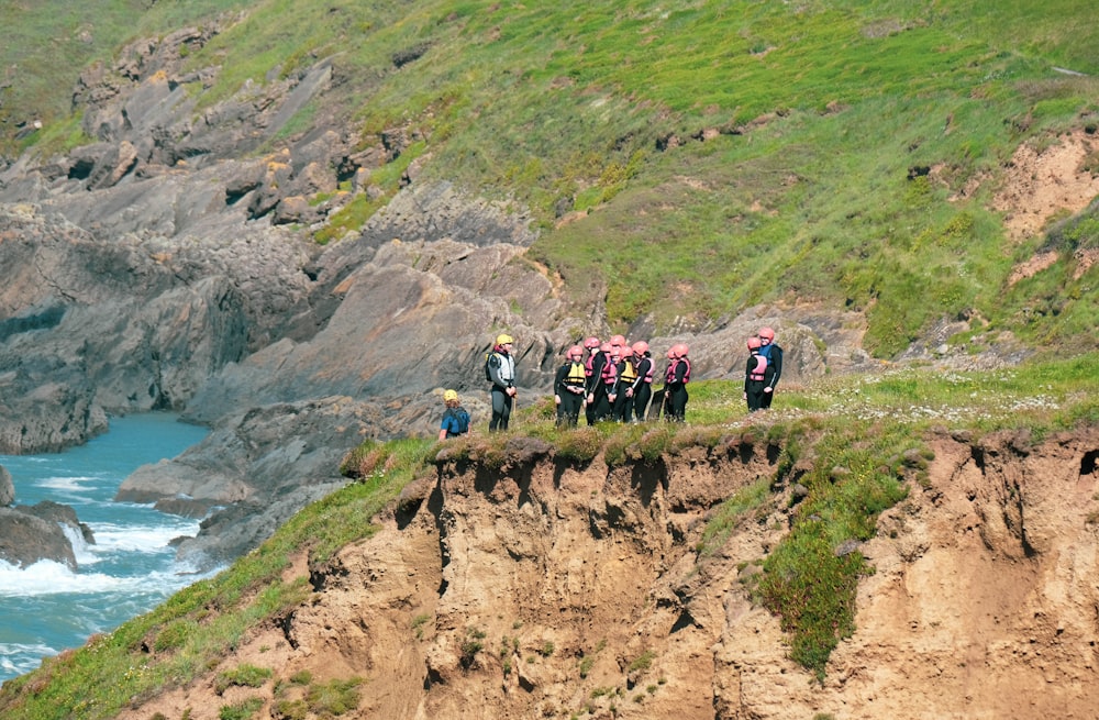 people hiking on mountain during daytime