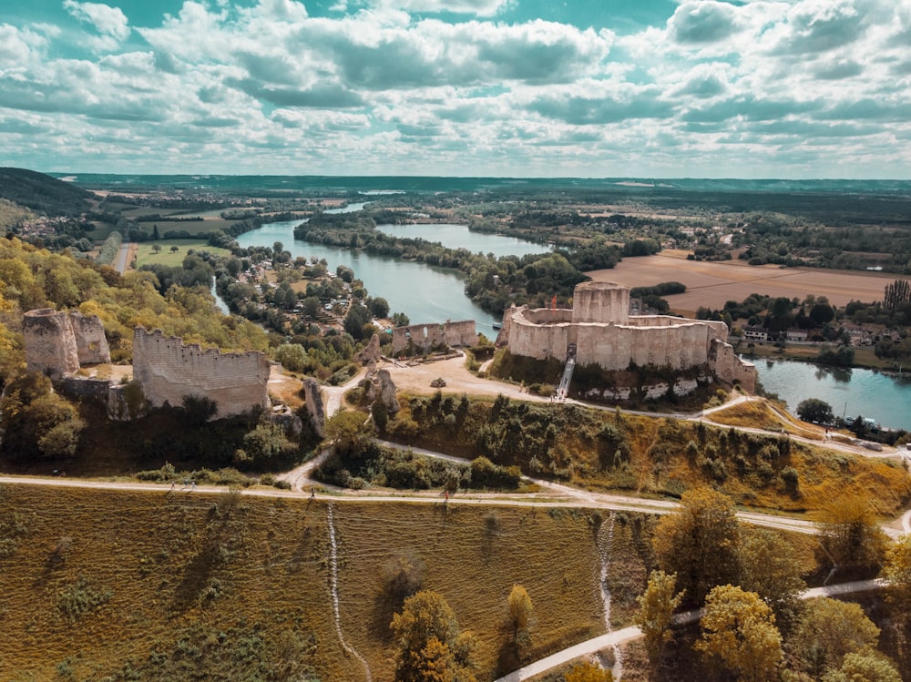 aerial view of city near body of water during daytime