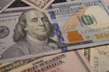 A close-up of genuine dollar bills representing our commitment.