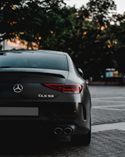 black bmw m 3 on road during daytime