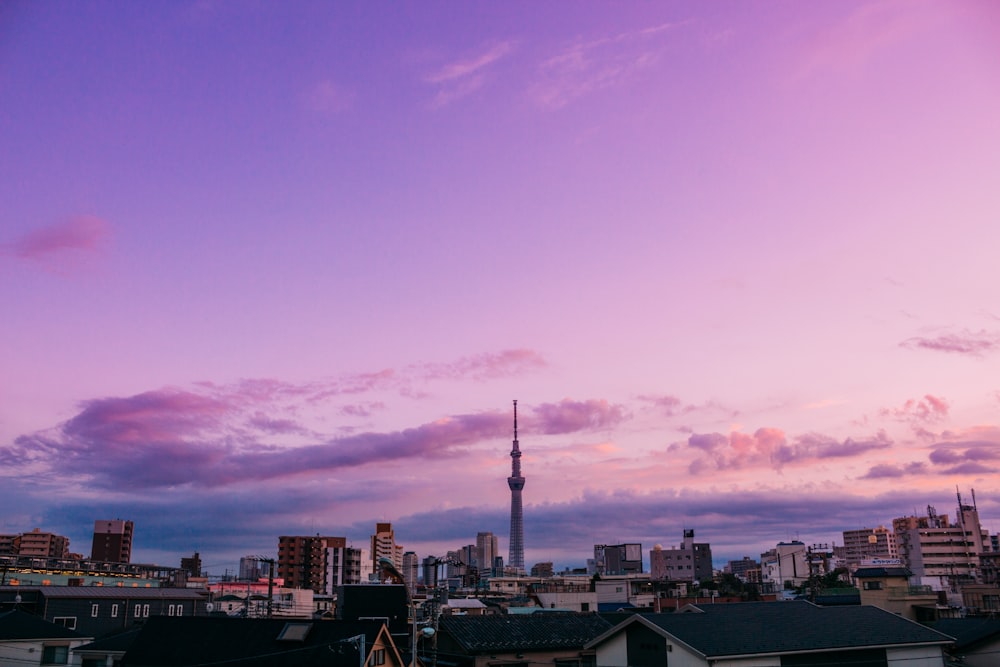 city skyline under blue sky during daytime