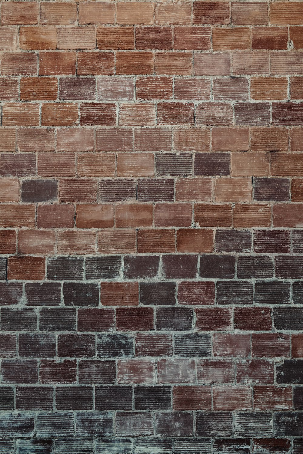 Pared de ladrillo marrón y negro