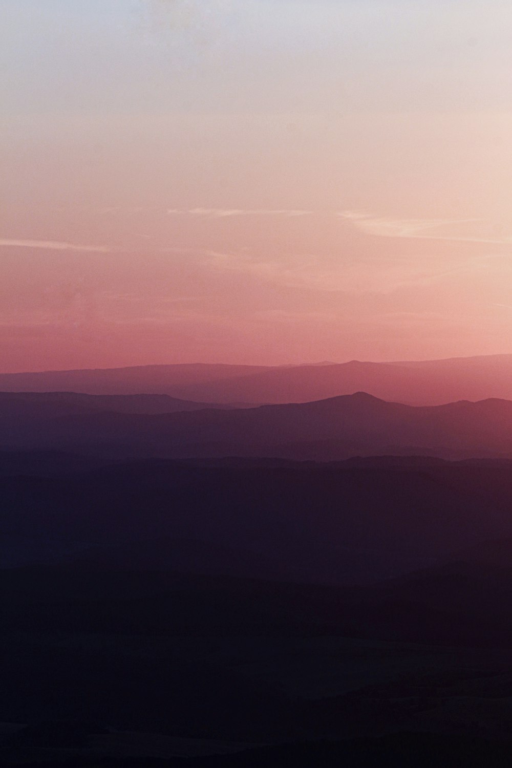 silhouette of mountains during sunset