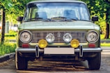 yellow and silver car on road during daytime