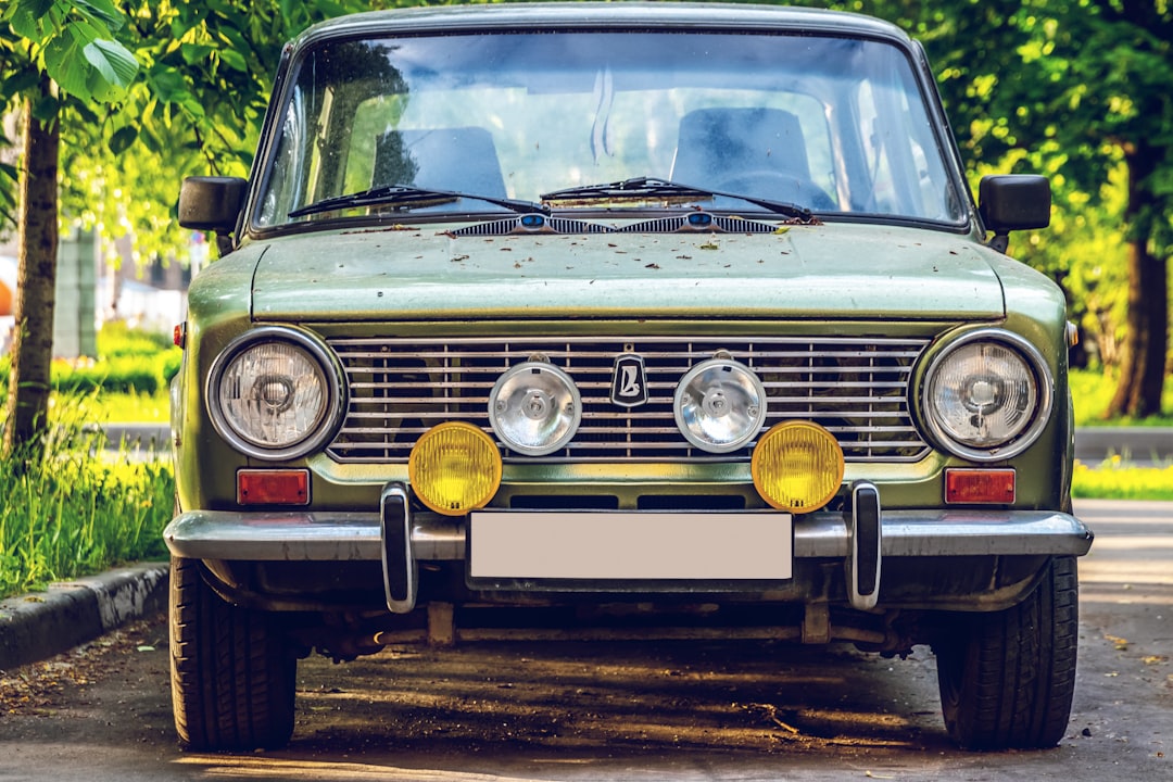 yellow and silver car on road during daytime