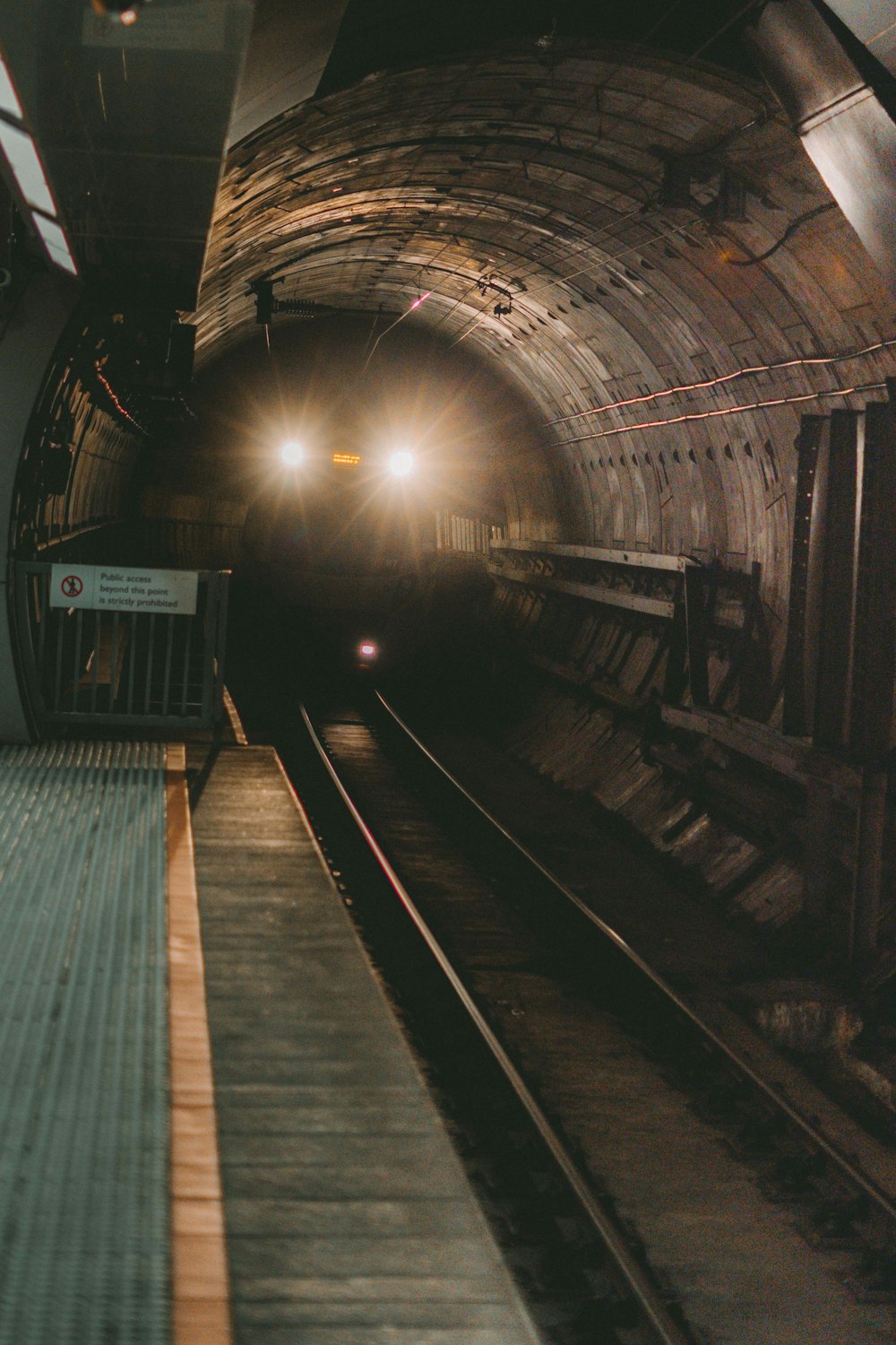 train rail tracks in tunnel