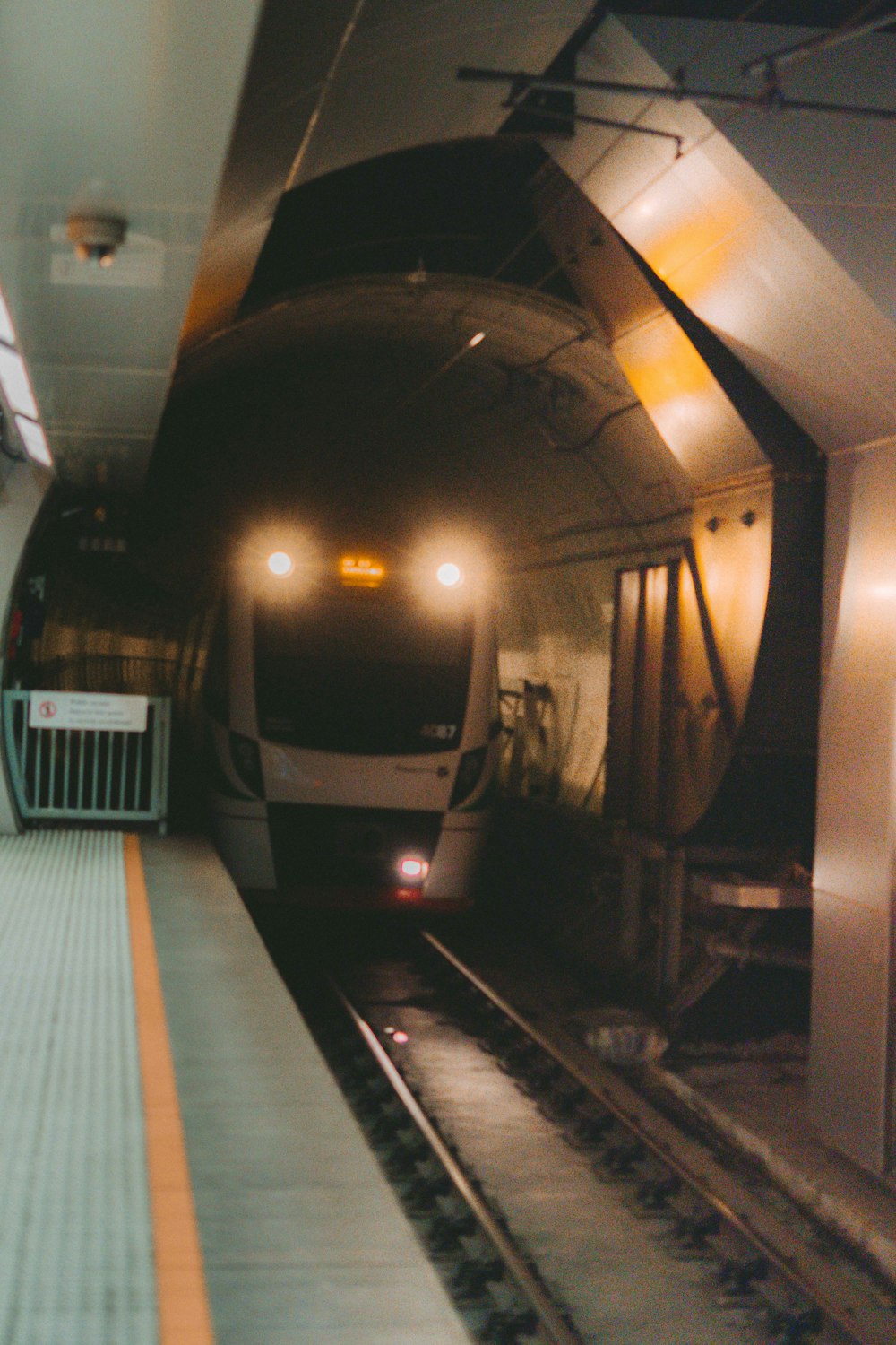 white train in train station