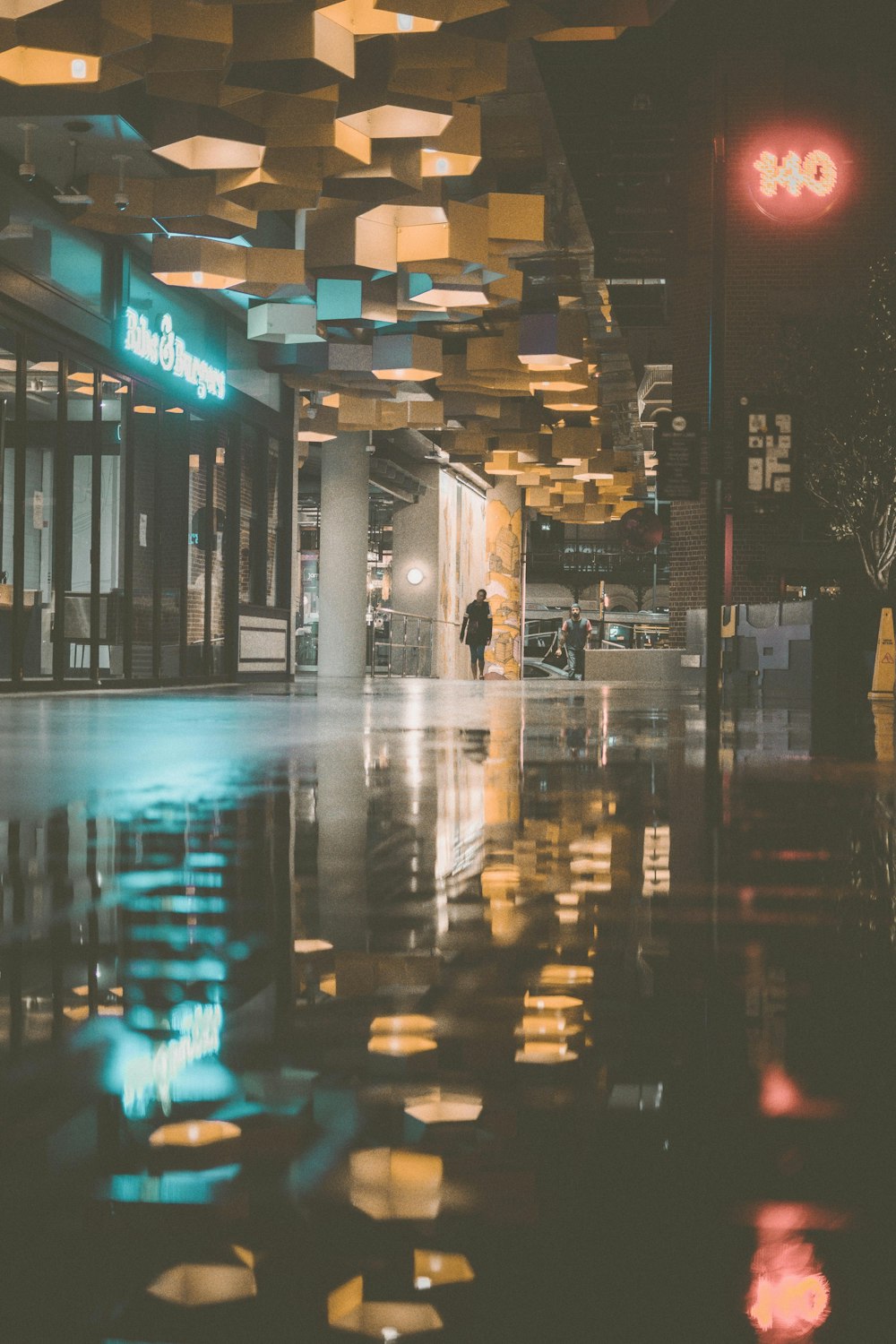 city buildings with lights during night time