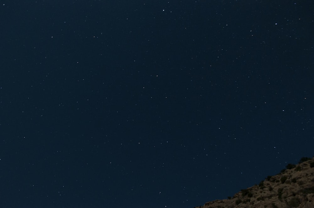 starry night sky over the mountain