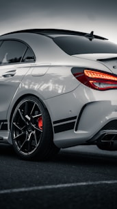 silver and red car on road