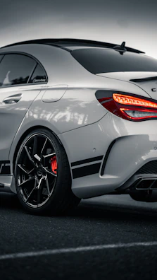 silver and red car on road