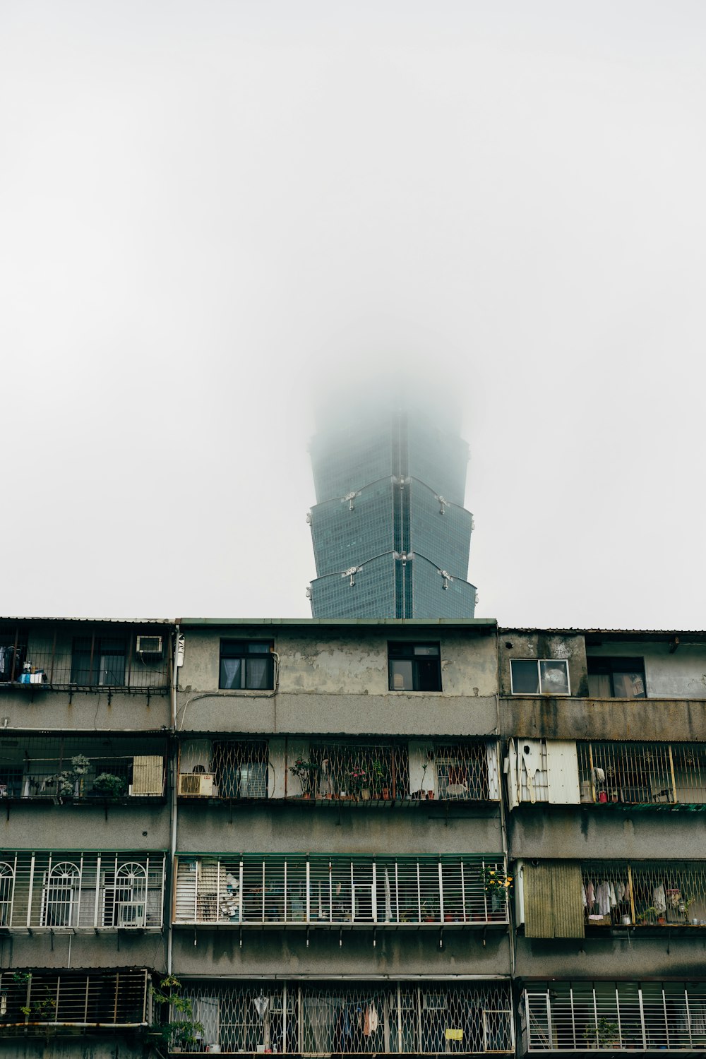 gray concrete building under white sky during daytime