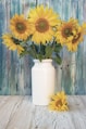 yellow sunflower in white ceramic vase