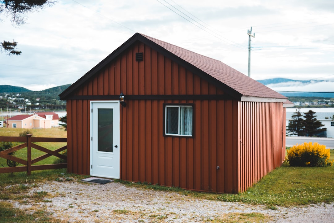 brown wooden house under blue sky during daytime