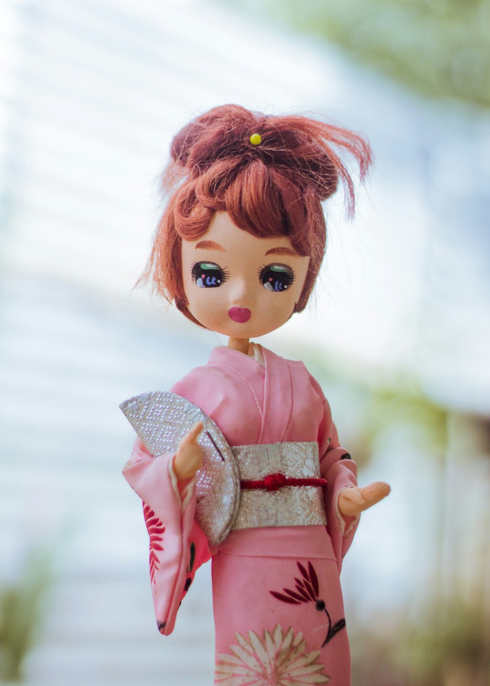 red haired girl in pink dress doll