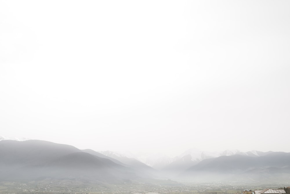 black mountains under white sky during daytime