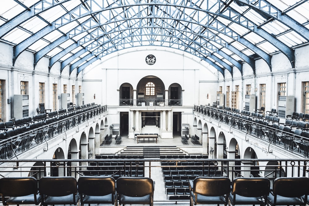 brown and black chairs inside building