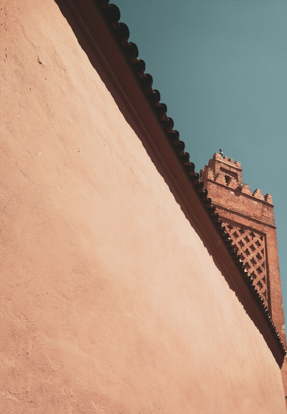 brown concrete building under blue sky during daytime