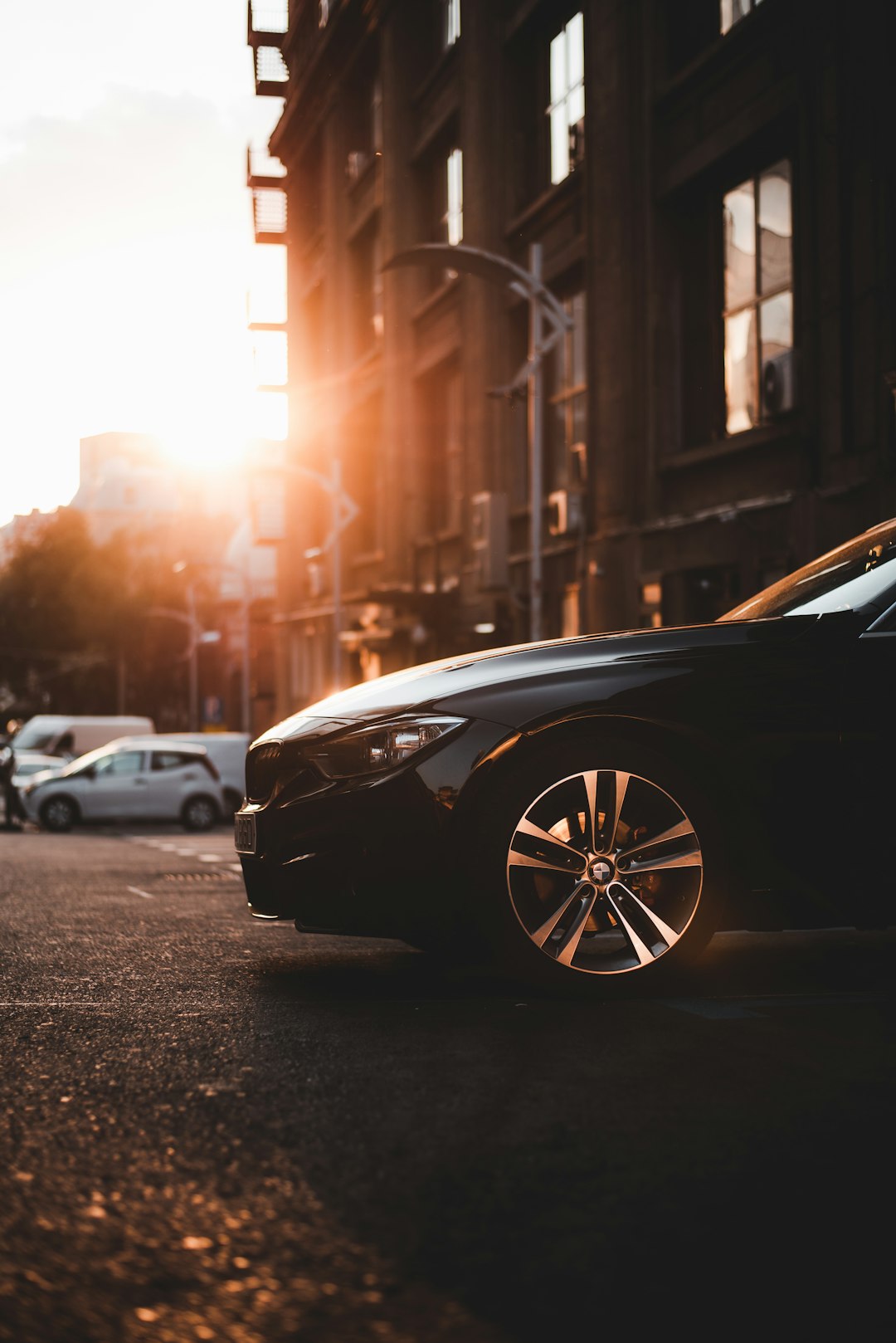 black car on road during daytime