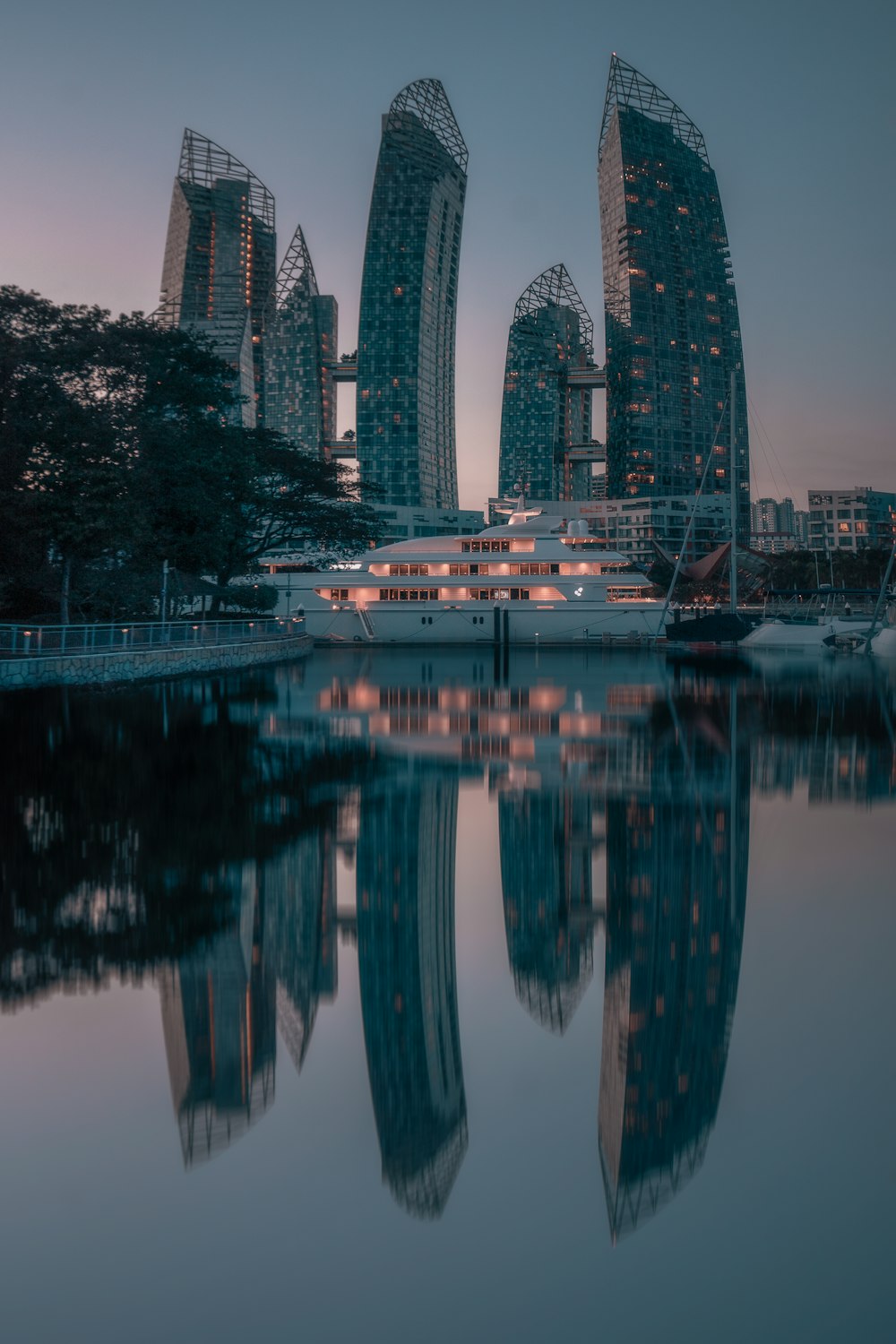 body of water near high rise building during daytime