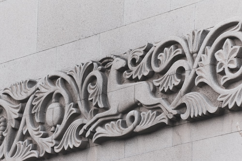 brown concrete wall with brown wooden carved