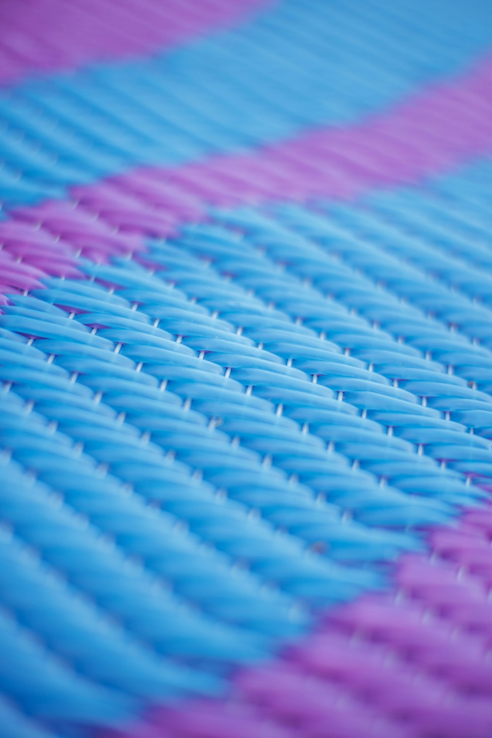 pink blue and purple textile