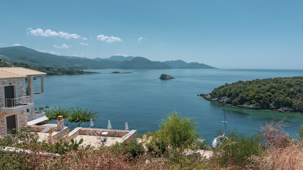 brown wooden dock on blue sea under blue sky during daytime