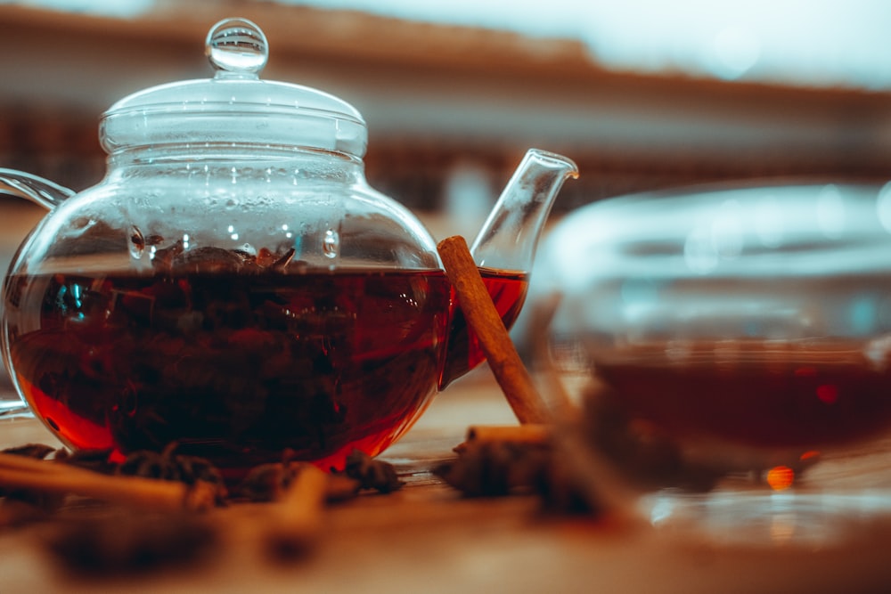 clear glass jar with red liquid