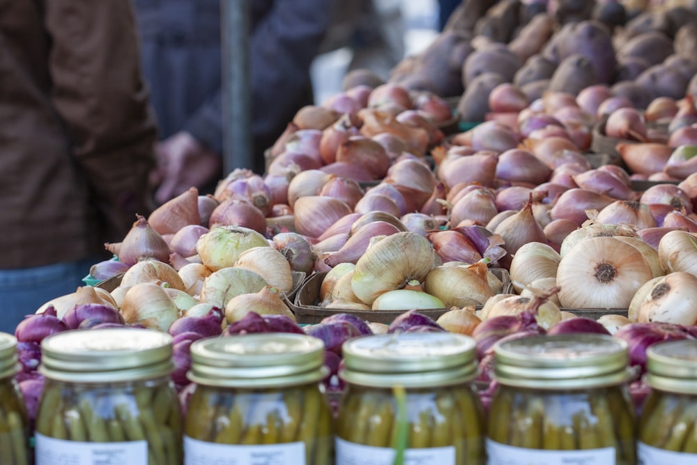 brown garlic on glass jar