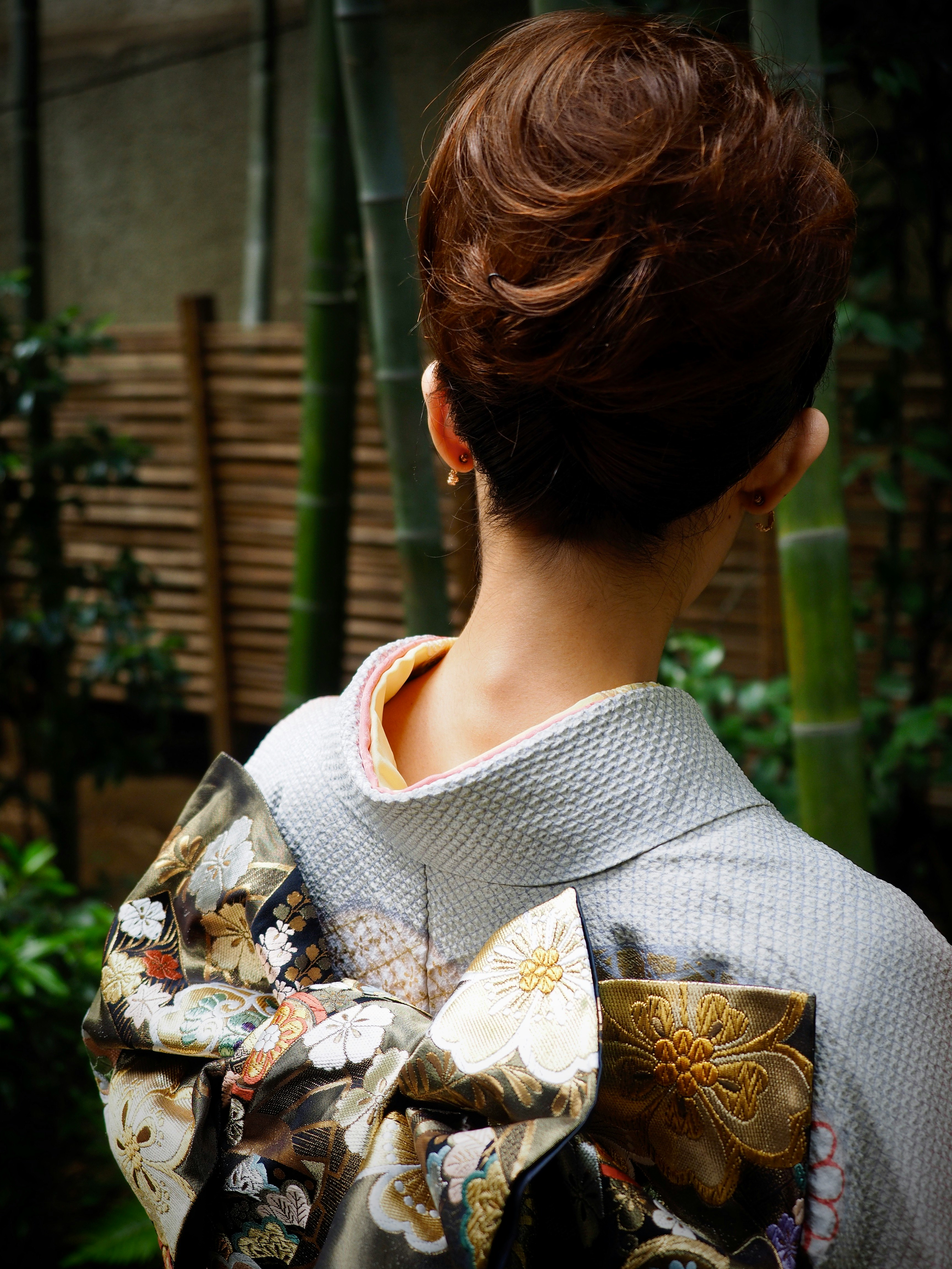 woman in white floral shirt