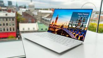 macbook pro on white table
