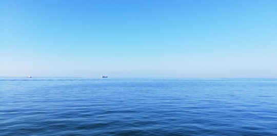 body of water under blue sky during daytime in Thessaloniki Greece