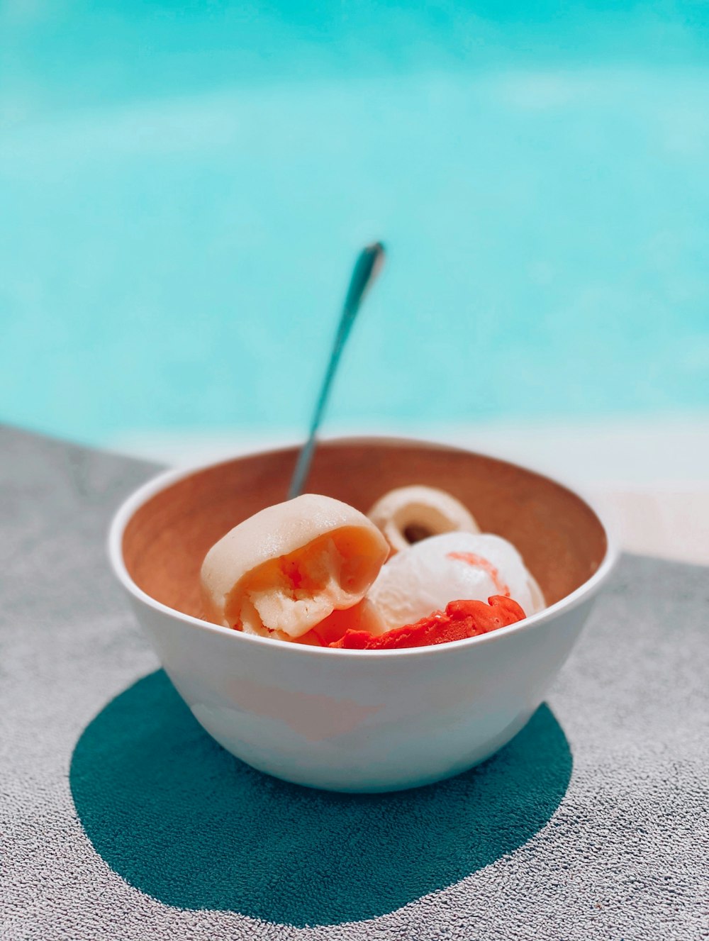 white ceramic bowl with spoon