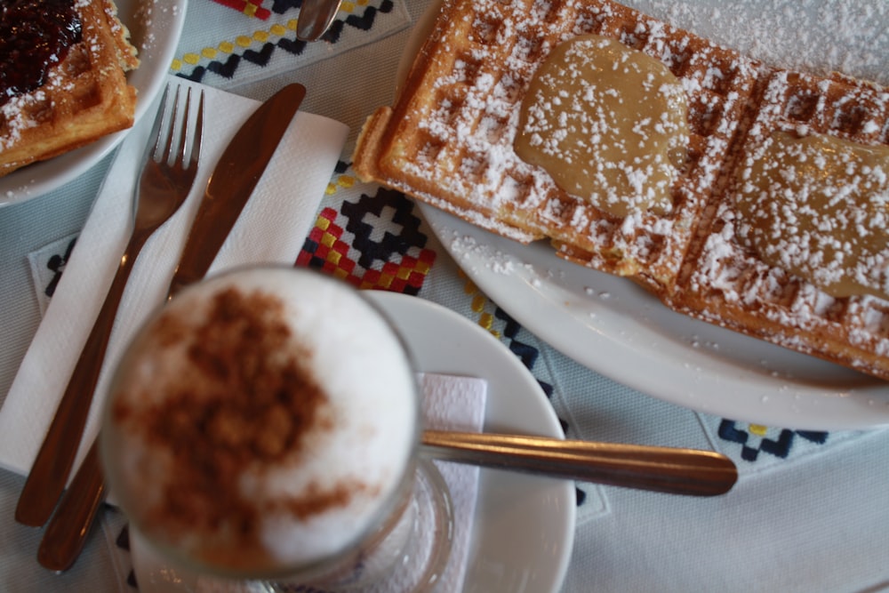 brown and white cake on white ceramic plate