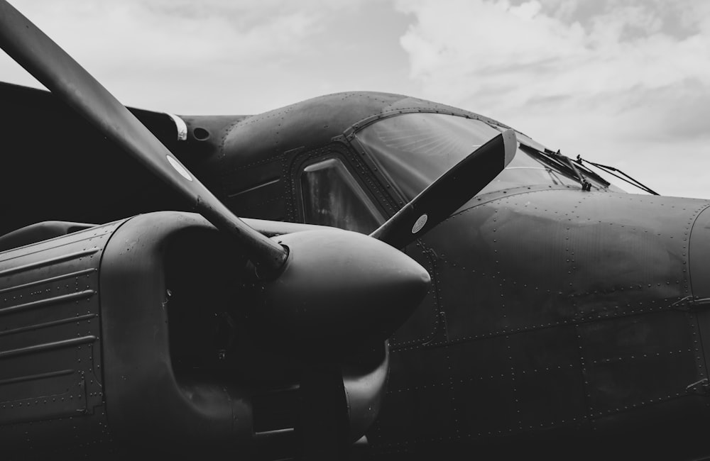 grayscale photo of a black and gray fighter plane