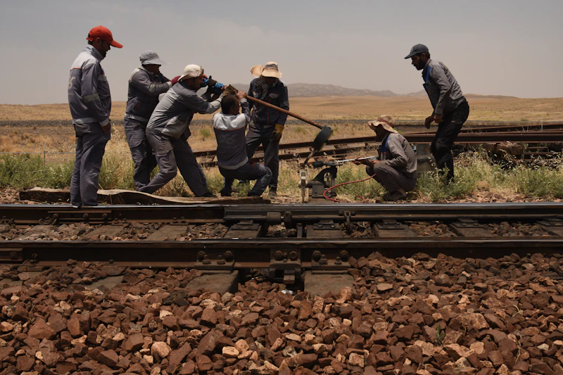 Track team walking the line during an inspection