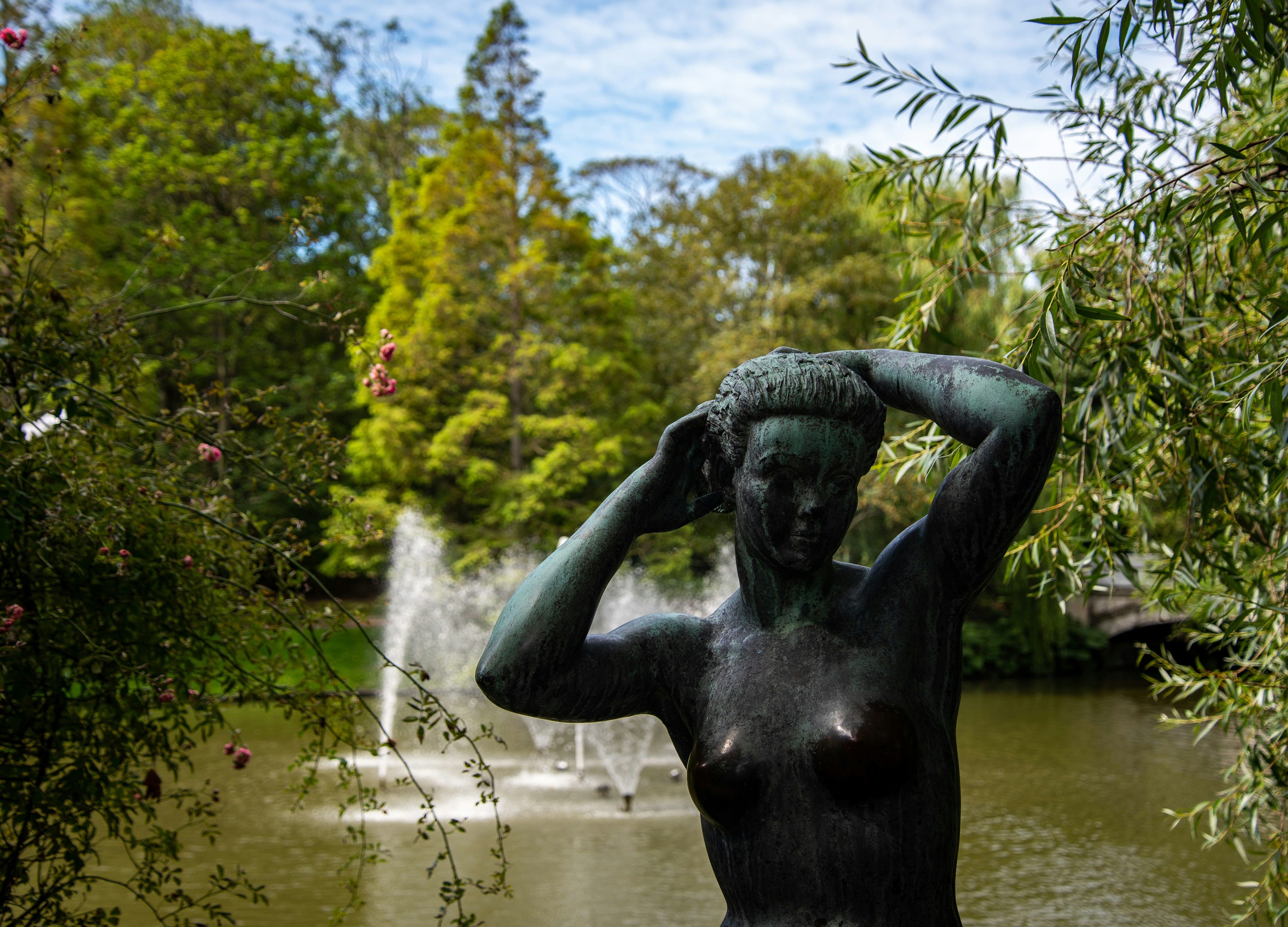 black statue on water fountain