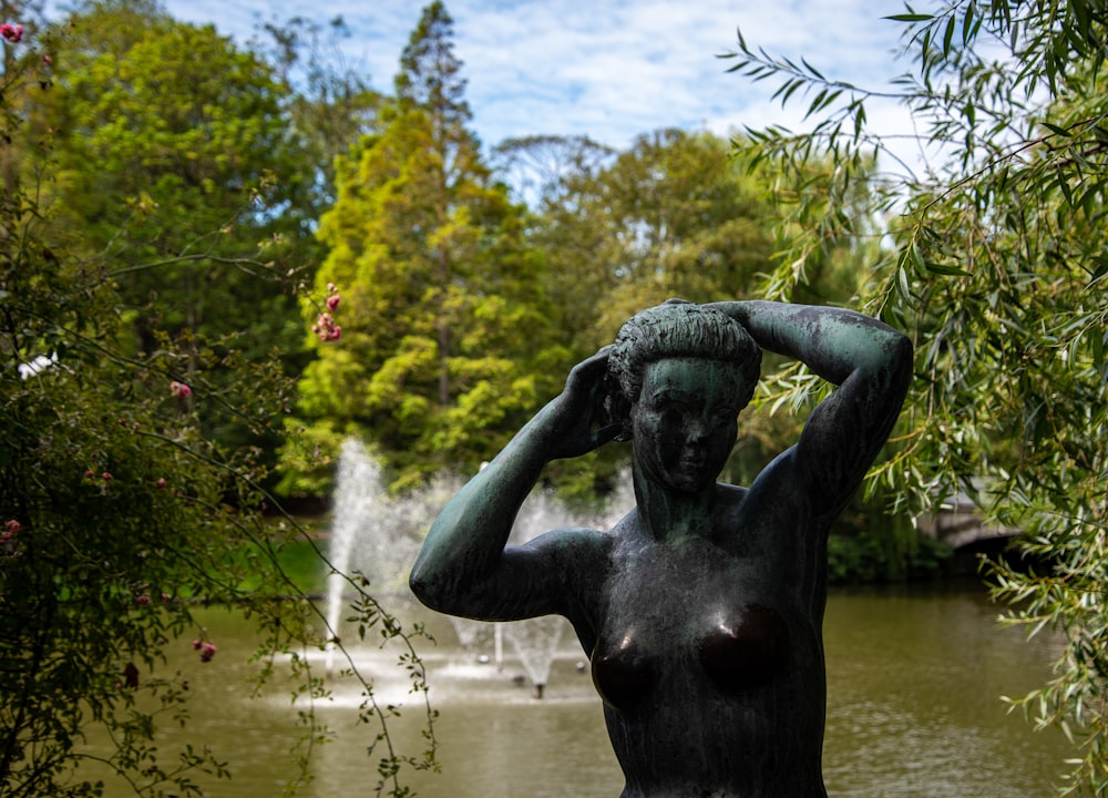 black statue on water fountain