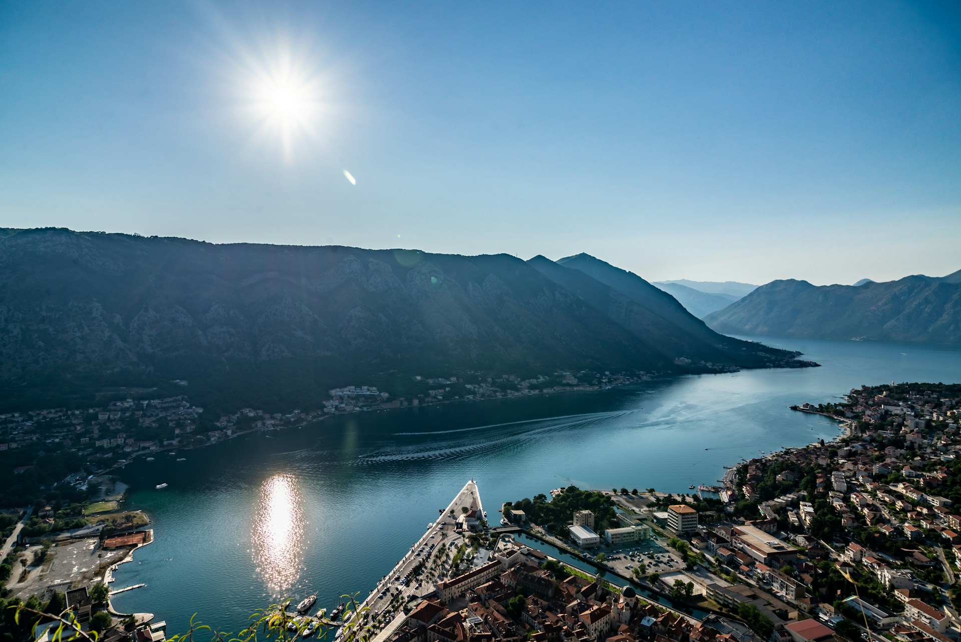 aerial view of city near lake during daytime