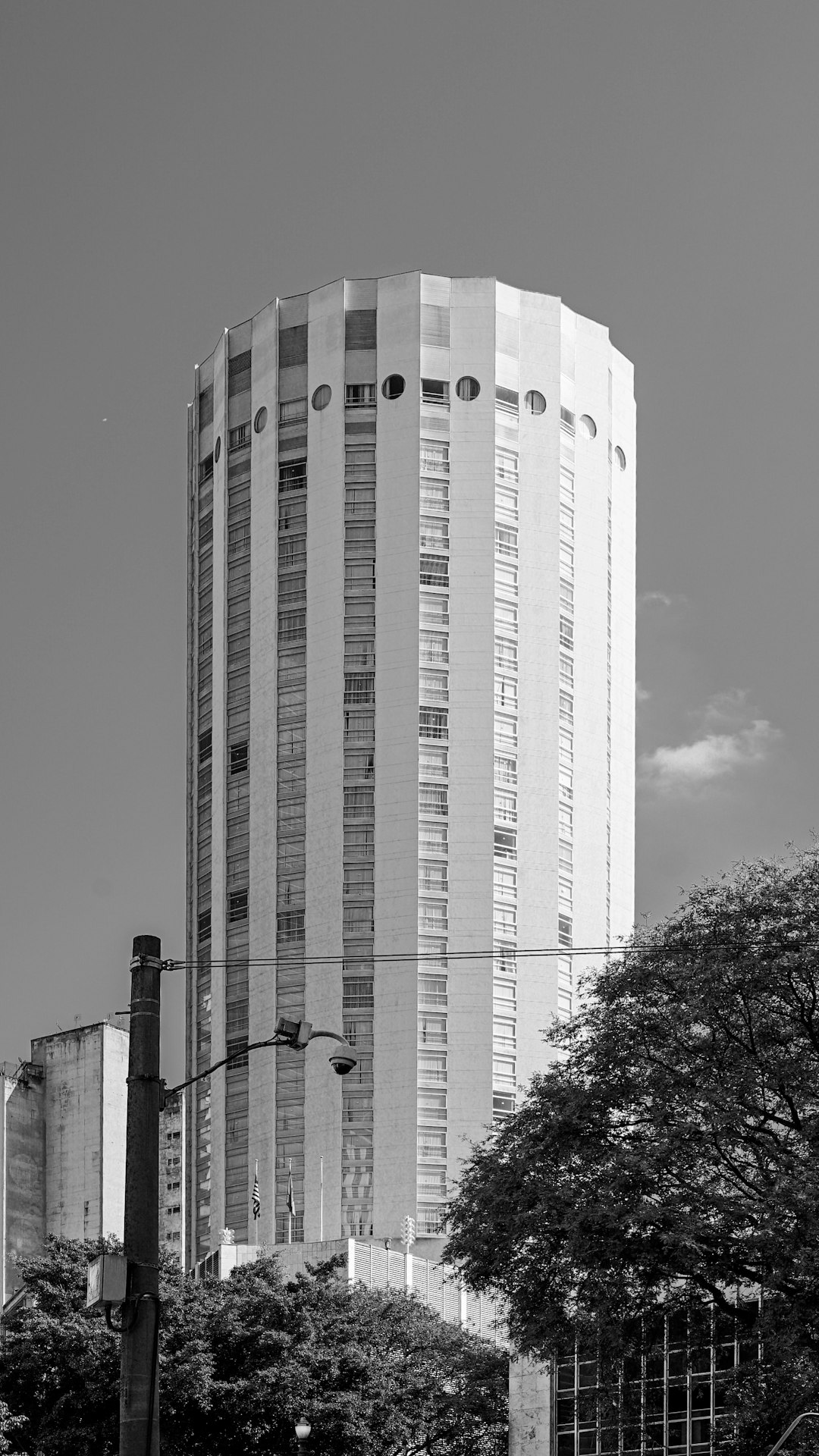 grayscale photo of high rise building