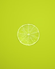 yellow lemon fruit on green background