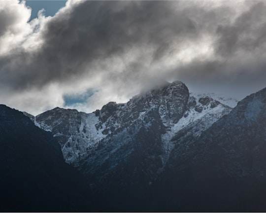 snow covered mountain under cloudy sky during daytime in Elandskloof South Africa