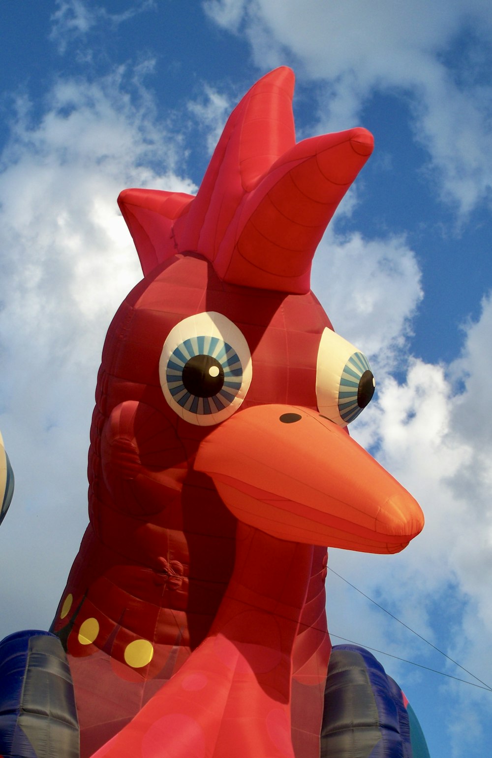 red and yellow inflatable bird