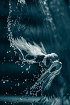 white and blue water splash