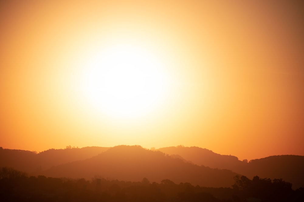 sun setting over the mountains