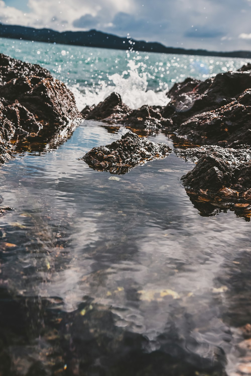 black and white stone on water