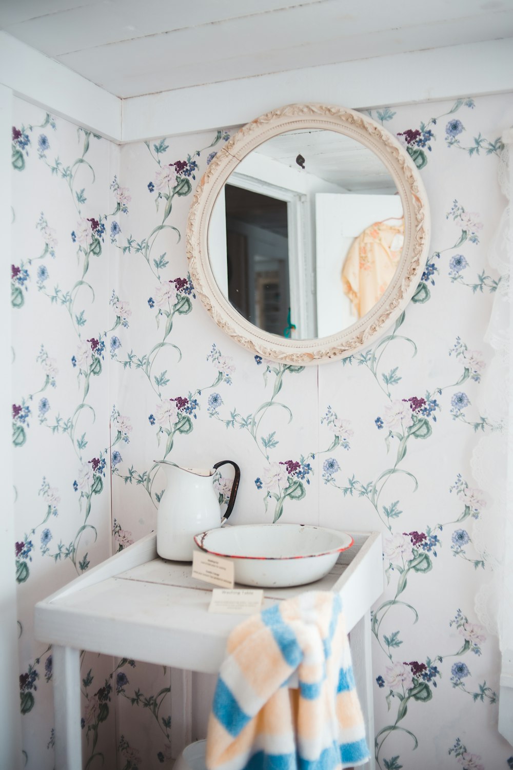 white ceramic sink with faucet